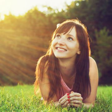 happy-woman-on-grass-sq happy-woman-on-grass-sq